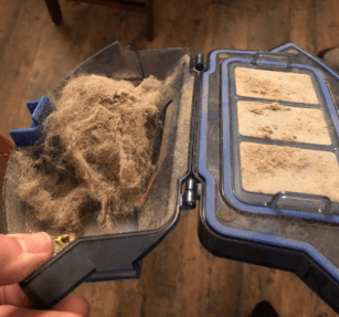 dust and pet hair collected by eufy [BoostIQ] RoboVac 15C